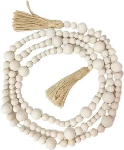 White wooden bead garland with tan tassels for women’s boho chic decorations