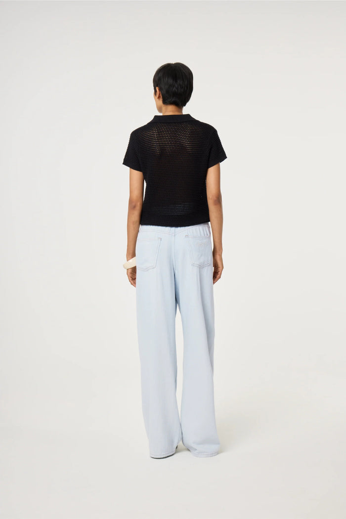 Back view of model wearing Fabienne Chapot Fin Jumper Black by Fabienne Chapot, shop Fabienne Chapot at Dotique