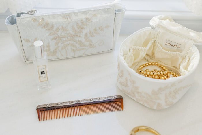 Fern makeup bag and open jewelry case with accessories by Lenora