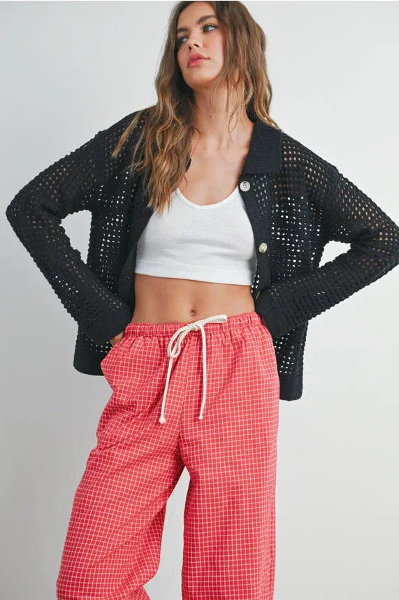 Women’s black open stitch crochet collar cardigan with white buttons for stylish layering