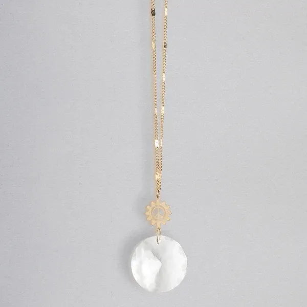 Gold chain necklace with small gear charm and round white translucent pendant pocket suncatcher for women’s boho chic clothing from shop daisy
