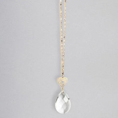 A pocket suncatcher featuring a gold-toned chain and clear faceted teardrop crystal pendant with heart-shaped bail