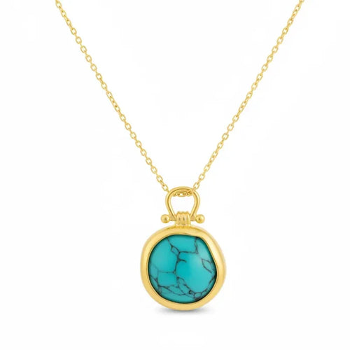 Gold dipped turquoise stone pendant on a turquoise gold boho necklace for a stylish look